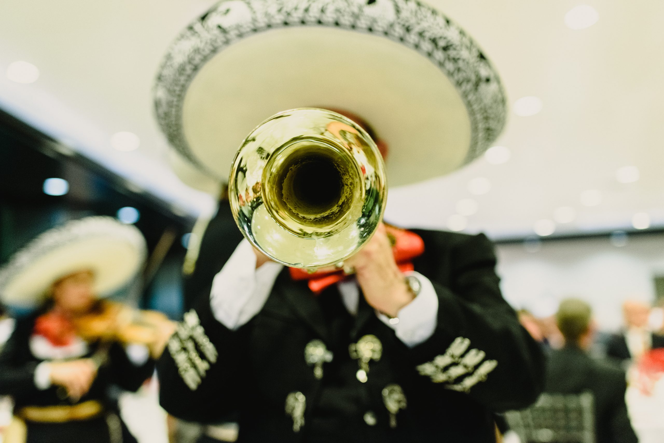 Mexican musician with his trumpet and guitars Mexican musician with his trumpet and guitars
